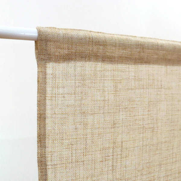 Close-up of textured top hem of brown noren