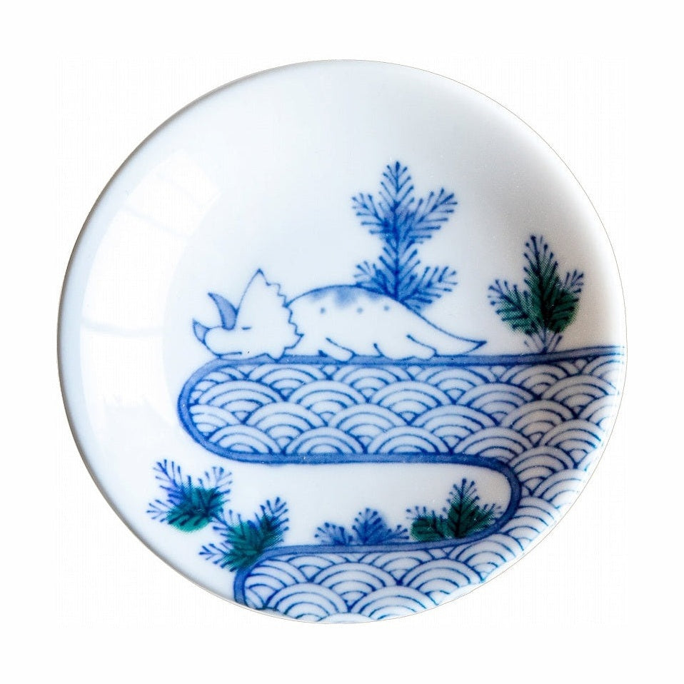 Blue sea wave and Triceratops dinosaur ceramic side plate close-up