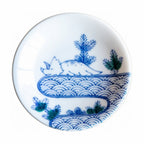 Blue sea wave and Triceratops dinosaur ceramic side plate close-up