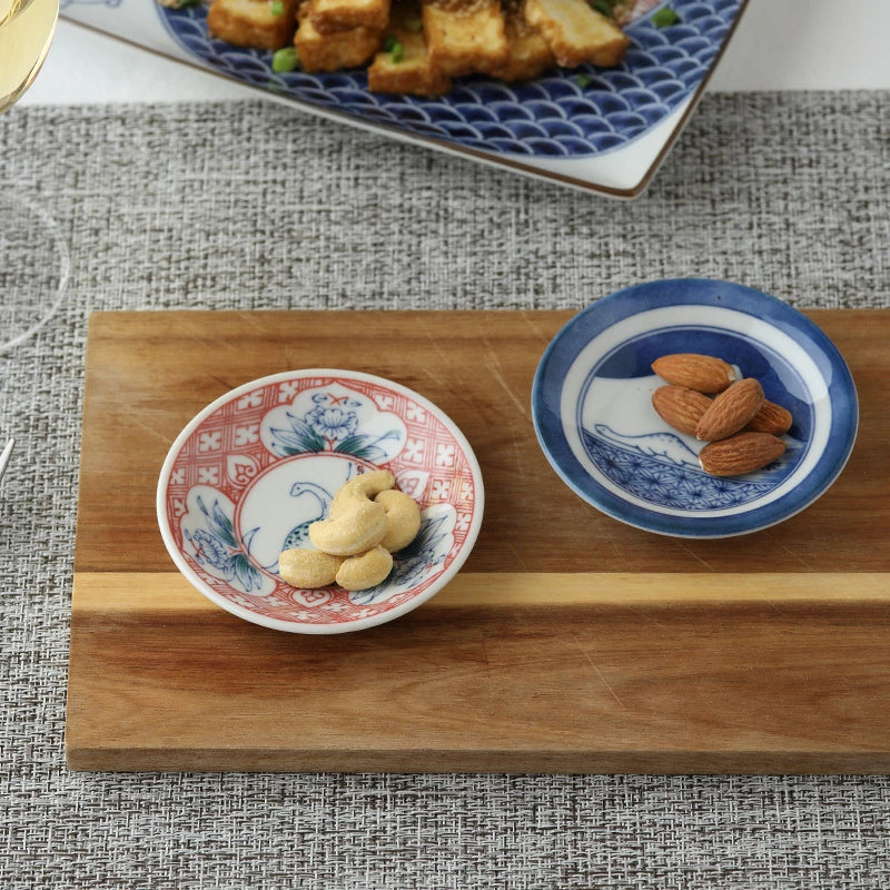 Edokko dinosaur and peacock pattern small ceramic plates with nuts