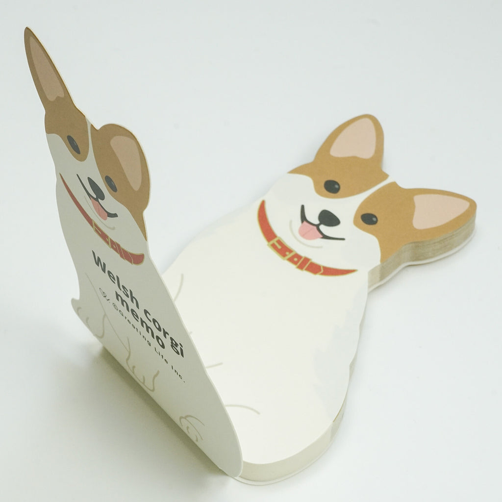 Peeling page from upright corgi silhouette note pad
