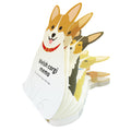 Fanned stack of multiple corgi designs on memo pad