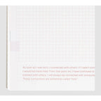 Close-up of red dashed grid paper in Hobonichi Techo 2024 with inspirational quote text