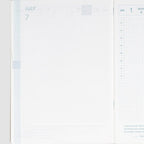 July 7th open page in black gingham 2024 diary showing weekly layout and faint grid lines