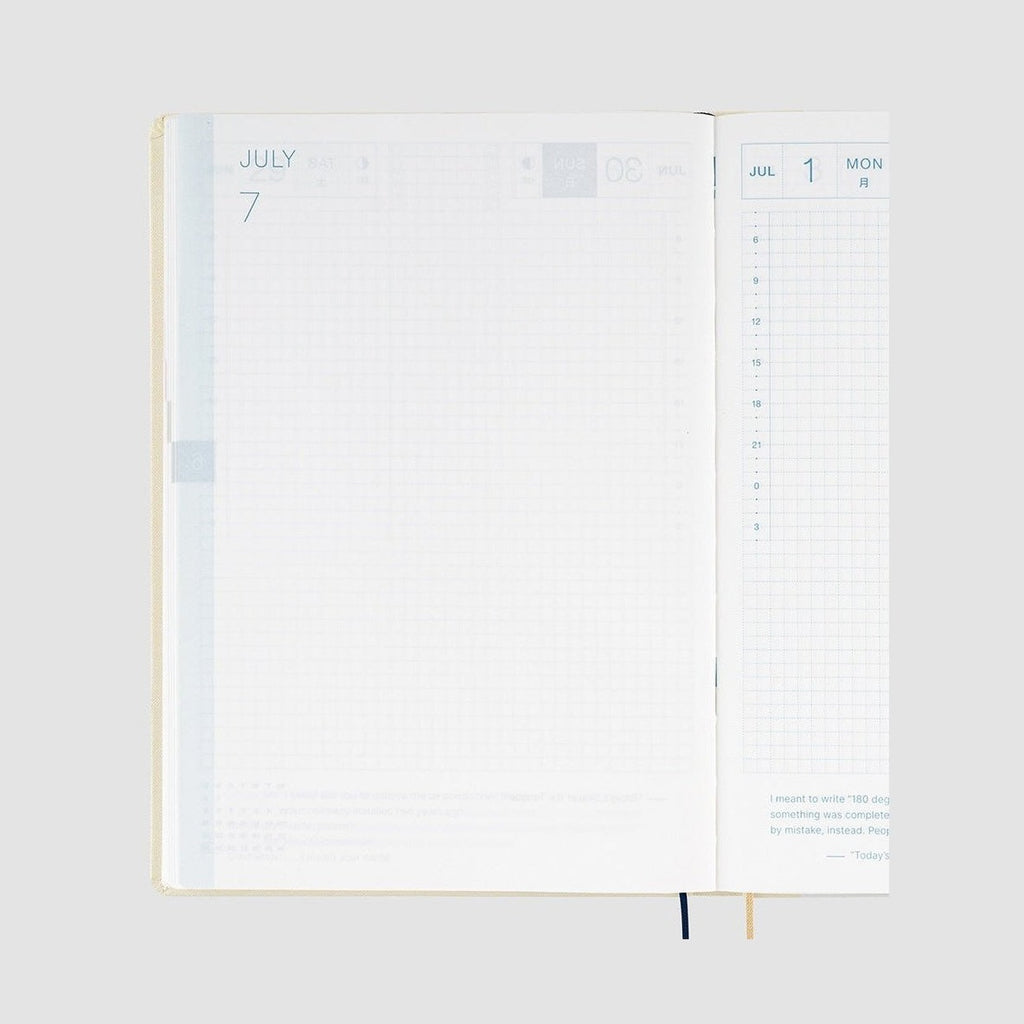 Hobonichi Techo 2024 July spread showing dual language daily layout and blue grid lines