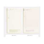 Hobonichi Techo 2024 open pages showing Japanese and English daily layouts with grid lines