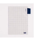 Close-up of transparent grid insert page protector with HOBONICHI clip and ruler