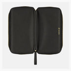 Open Hobonichi Techo Weeks Notte cover flat lay showing inner panels and logo