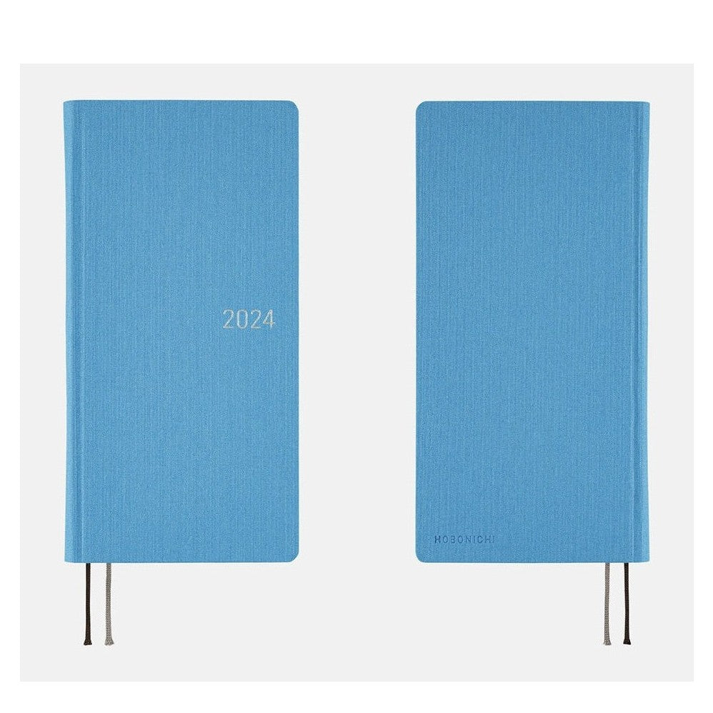 Hobonichi Techo 2024 Weeks Celeste Blue closed notebook with silver foil lettering and ribbons
