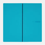 Open Hobonichi Techo 2024 MEGA diary showing aqua covers and spine detail