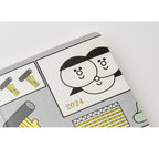 Hobonichi Techo 2024 front cover corner featuring gold foil year and cartoon faces