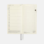 February 2024 Hobonichi Techo open spread featuring weekly calendar and grid notebook pages