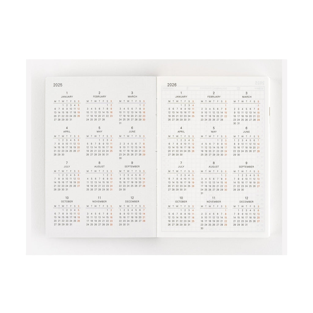 Hobonichi Techo 2025 A6 annual calendar overview with red weekend highlights and grid layout