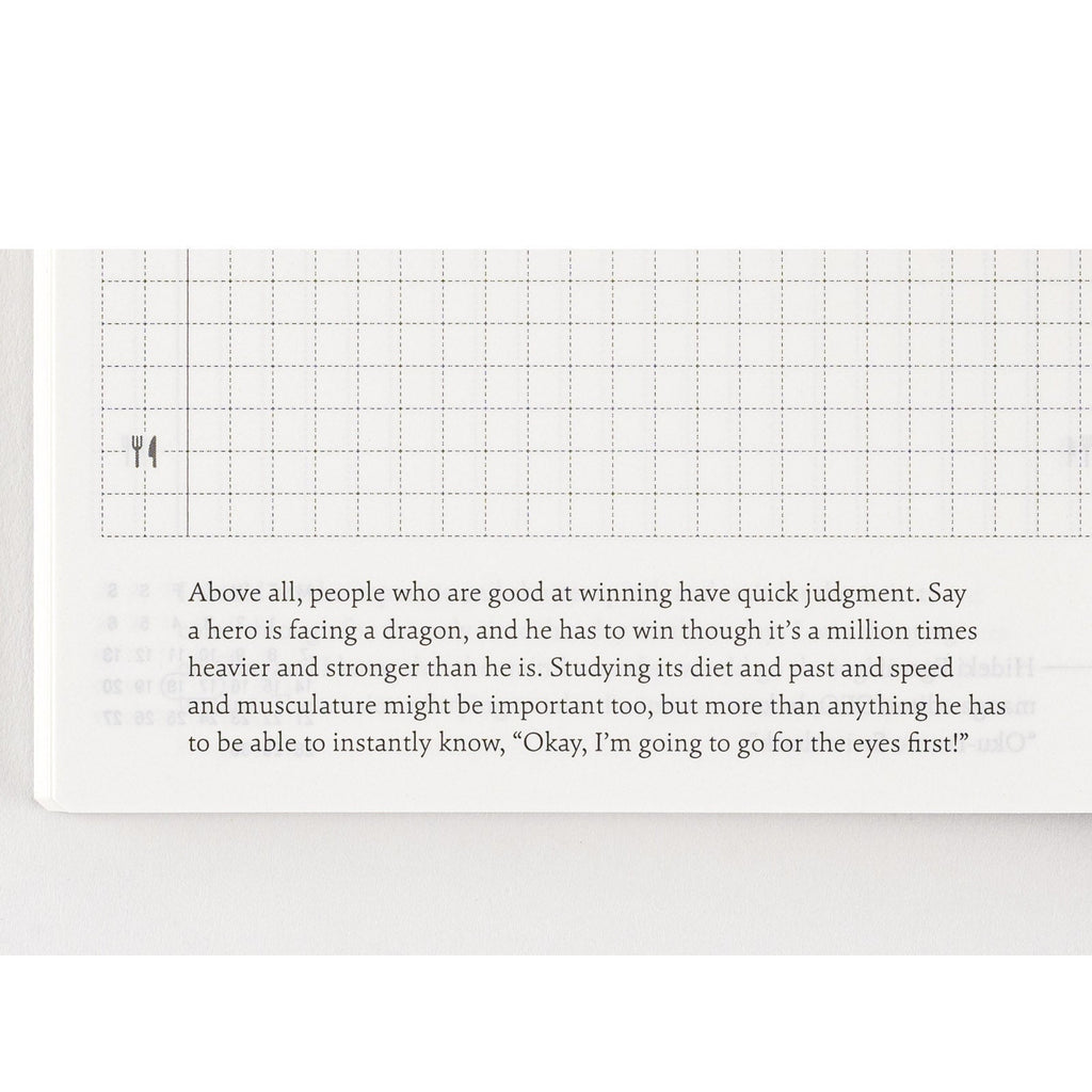 Close-up of Hobonichi Techo 2025 English planner page with dashed grid lines and quote text