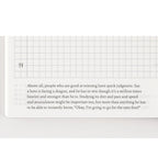 Close-up of Hobonichi Techo 2025 English planner page with dashed grid lines and quote text