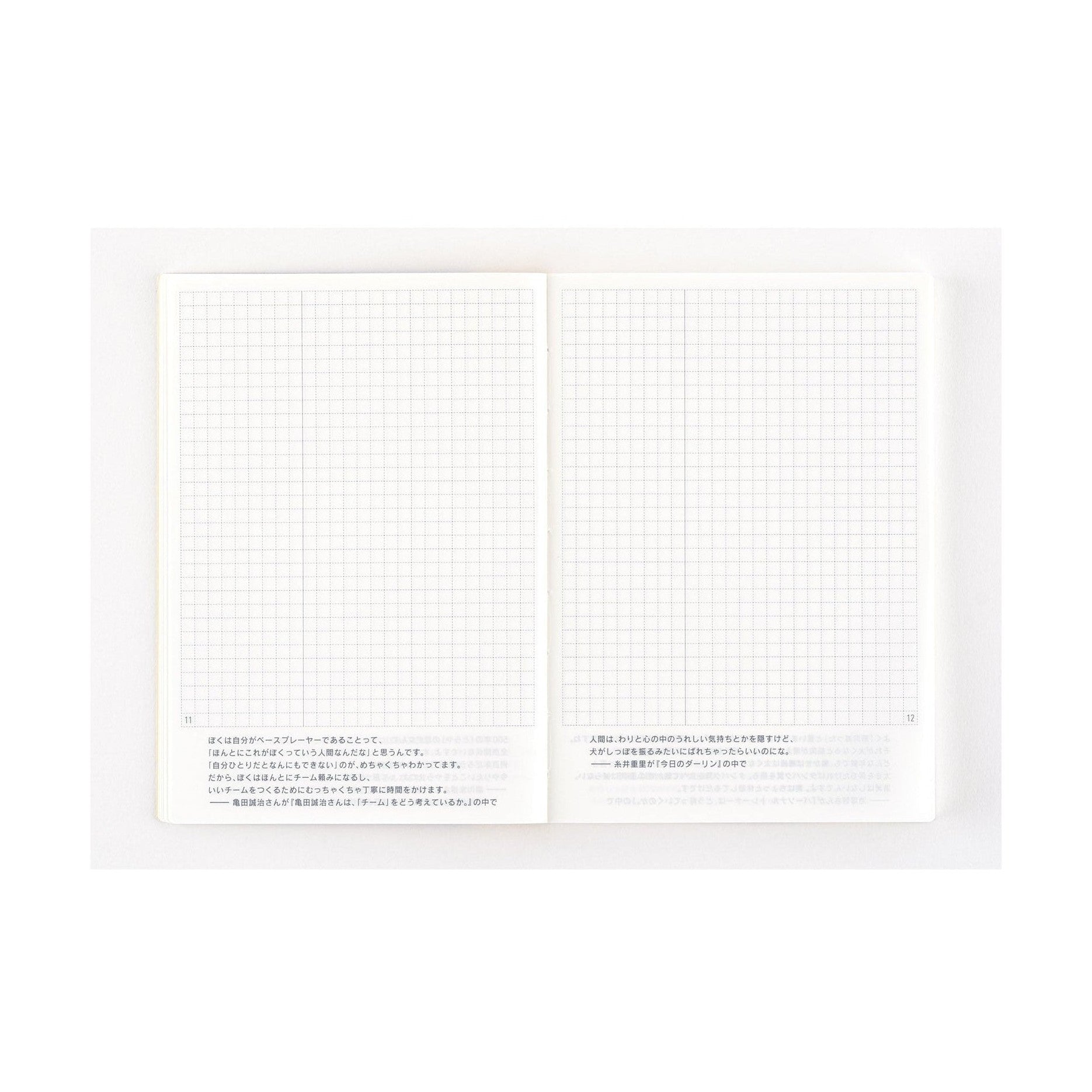Hobonichi Techo 2025 A6 diary open showing minimalist grid pages with Japanese text