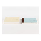 Hobonichi Techo 2025 A6 diary set in cream and blue covers showing spine details