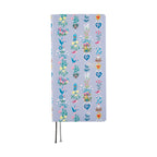 Hobonichi Techo 2025 Weeks closed lavender diary with vertical floral motifs and gold 2025 print