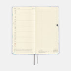 Hobonichi Techo 2025 Weeks July planner spread with daily schedule column and blank note grid