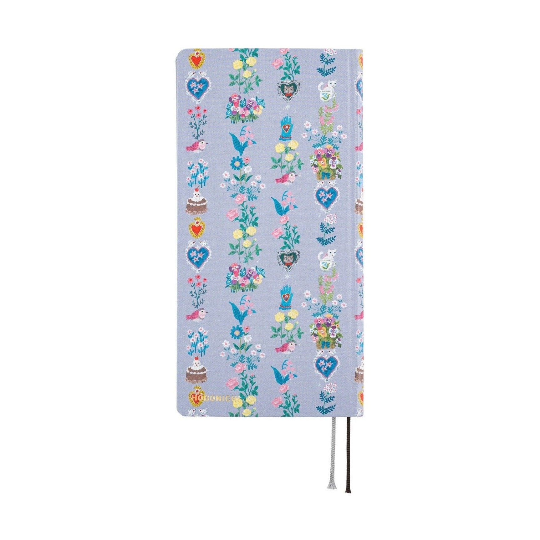 Hobonichi Techo 2025 Weeks closed light blue cover featuring Yumi Kitagishi fairy tale vertical pattern