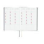 2026 yearly calendar spread in Hobonichi Techo A5 planner showing summer months with grid layout