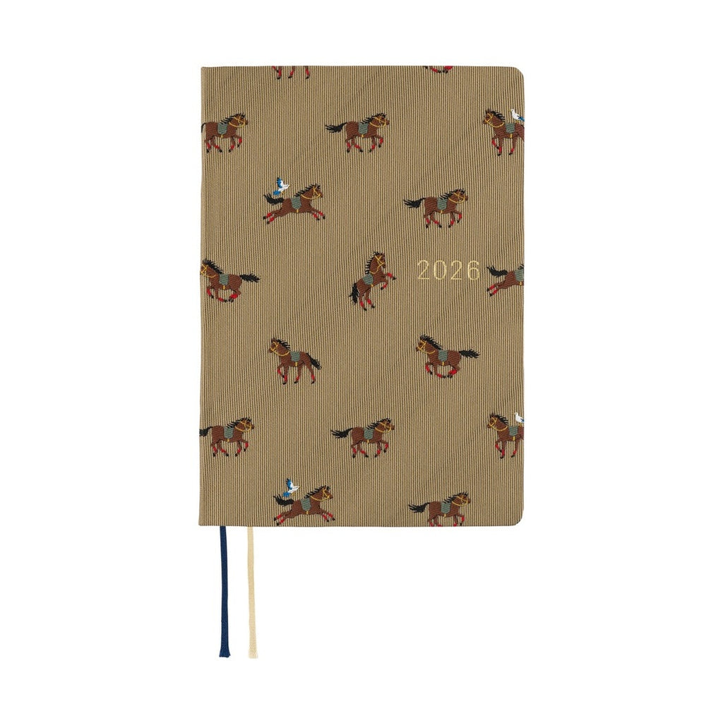 Front cover of Hobonichi Techo 2026 A6 diary featuring beige horse pattern