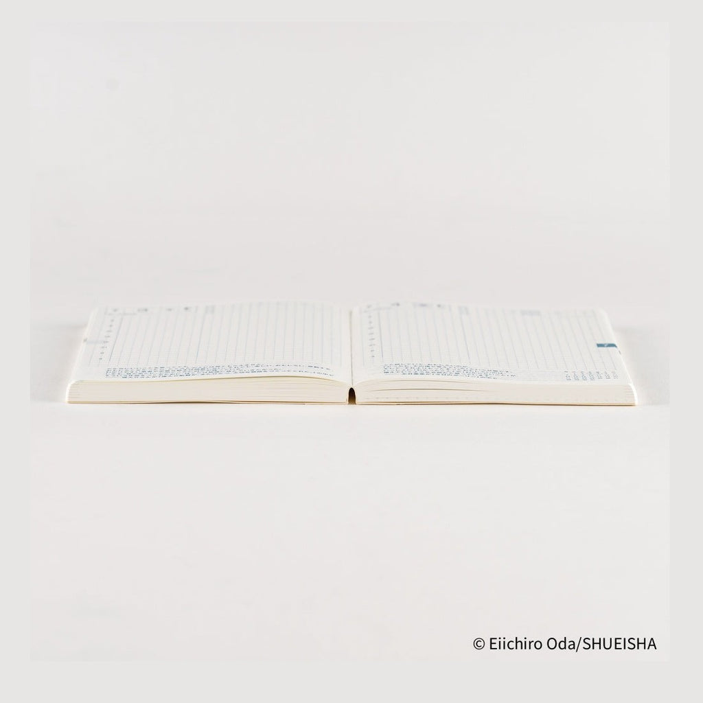 Hobonichi Techo 2026 One Piece A6 daily planner open spread with grid layout and blue Japanese text