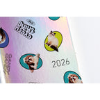Close-up of Candy Stripper 2026 diary cover with pink purple blue aurora gradient and glossy finish