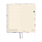 Hobonichi Techo 2026 April weekly spread with dotted grid notes page and animal border