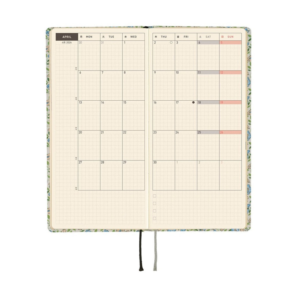 April 2026 weekly spread in Hobonichi Techo Liberty Sasha Kiora diary with grid and moon phases