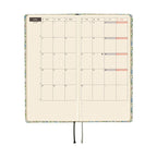 April 2026 weekly spread in Hobonichi Techo Liberty Sasha Kiora diary with grid and moon phases
