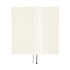 Hobonichi Techo 2026 open diary cream cover with embossed branding and ribbons