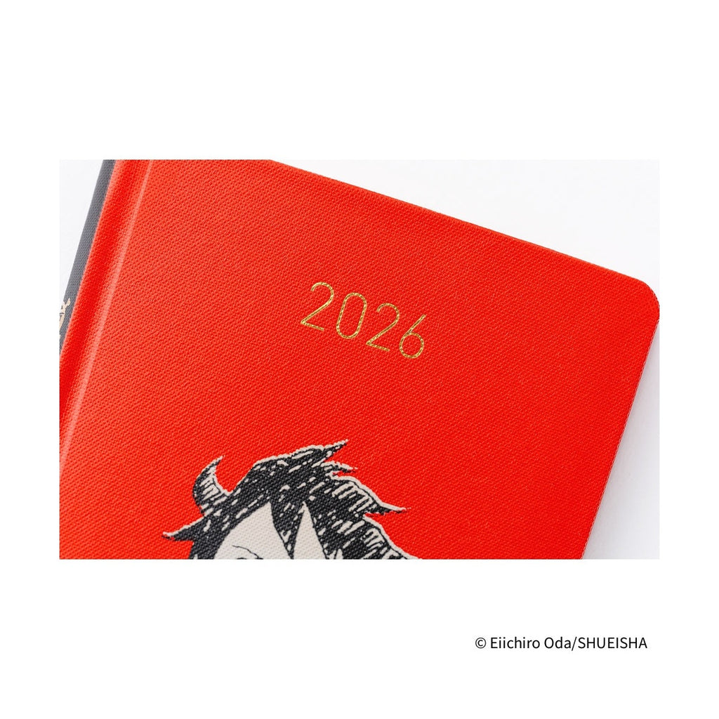 Hobonichi Techo 2026 red textured hardcover close-up gold foil