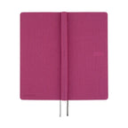 Open Hobonichi Techo 2026 Weeks MEGA ENG showing spine and cover texture in Peony Purple
