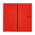 Upright Hobonichi Techo 2026 Weeks MEGA planner with embossed text on tomato red cover
