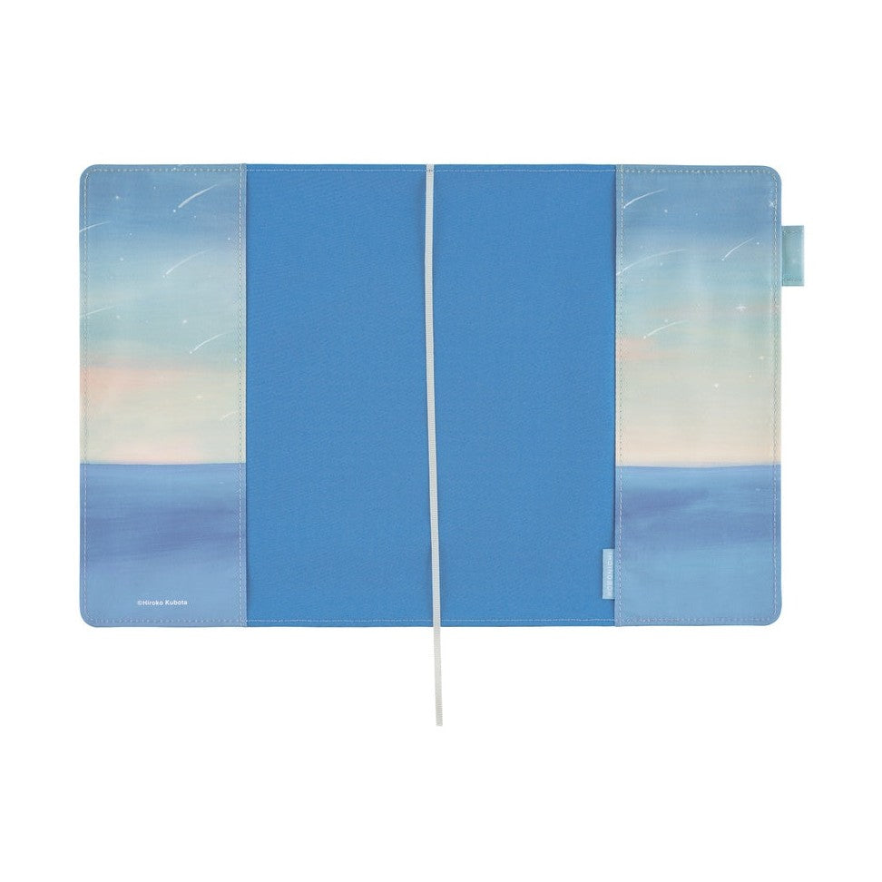 Closed A5 Hobonichi Techo cover with gradient sea sky, shooting stars, and elastic band closure