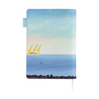 Hobonichi Techo A5 cover featuring yellow giraffes on dock with purple fish leaping from blue sea
