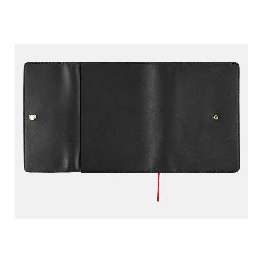 Open Hobonichi Techo A5 One Piece black leather cover showing dual button fasteners