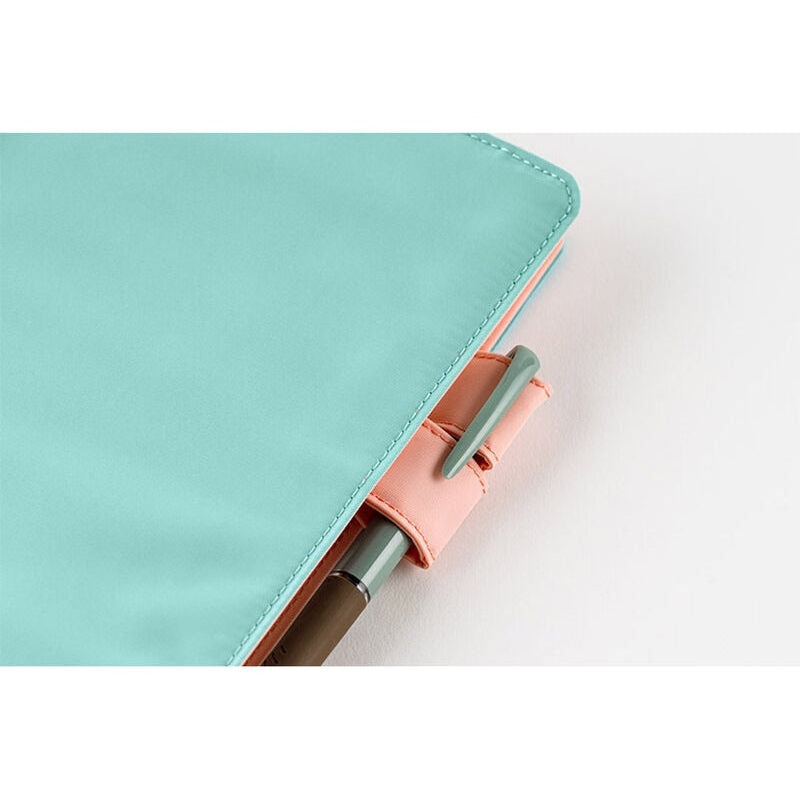 Dreamy Soda Hobonichi A5 butterfly-stopper pen holder securing a pen