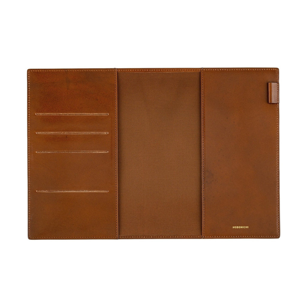 Interior of brown leather Hobonichi Techo A5 cover with pockets and gold logo