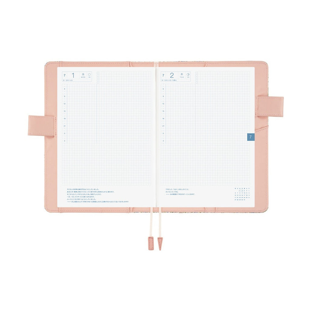 Hobonichi Techo A5 open with grid pages and pink Liberty anemone cover design