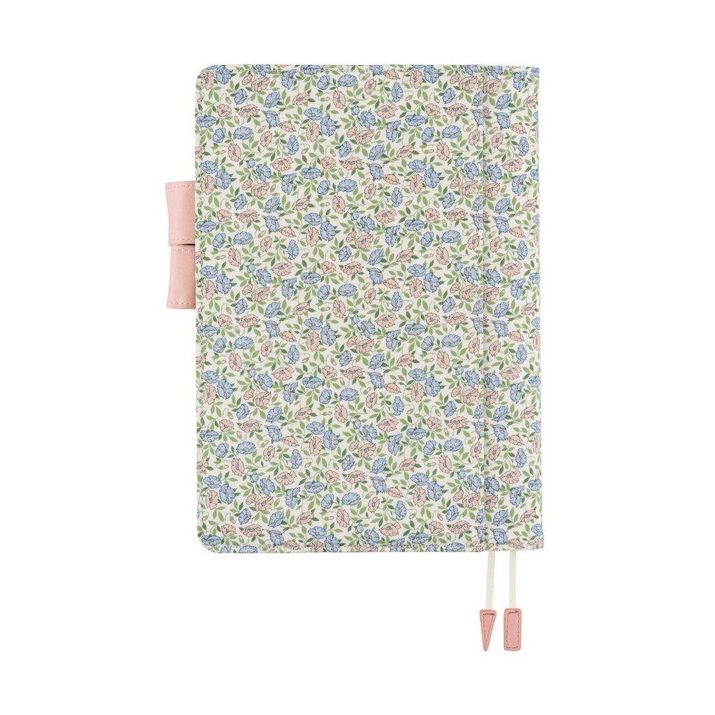 Closed A5 planner cover featuring soft pink and blue small-floral Liberty print