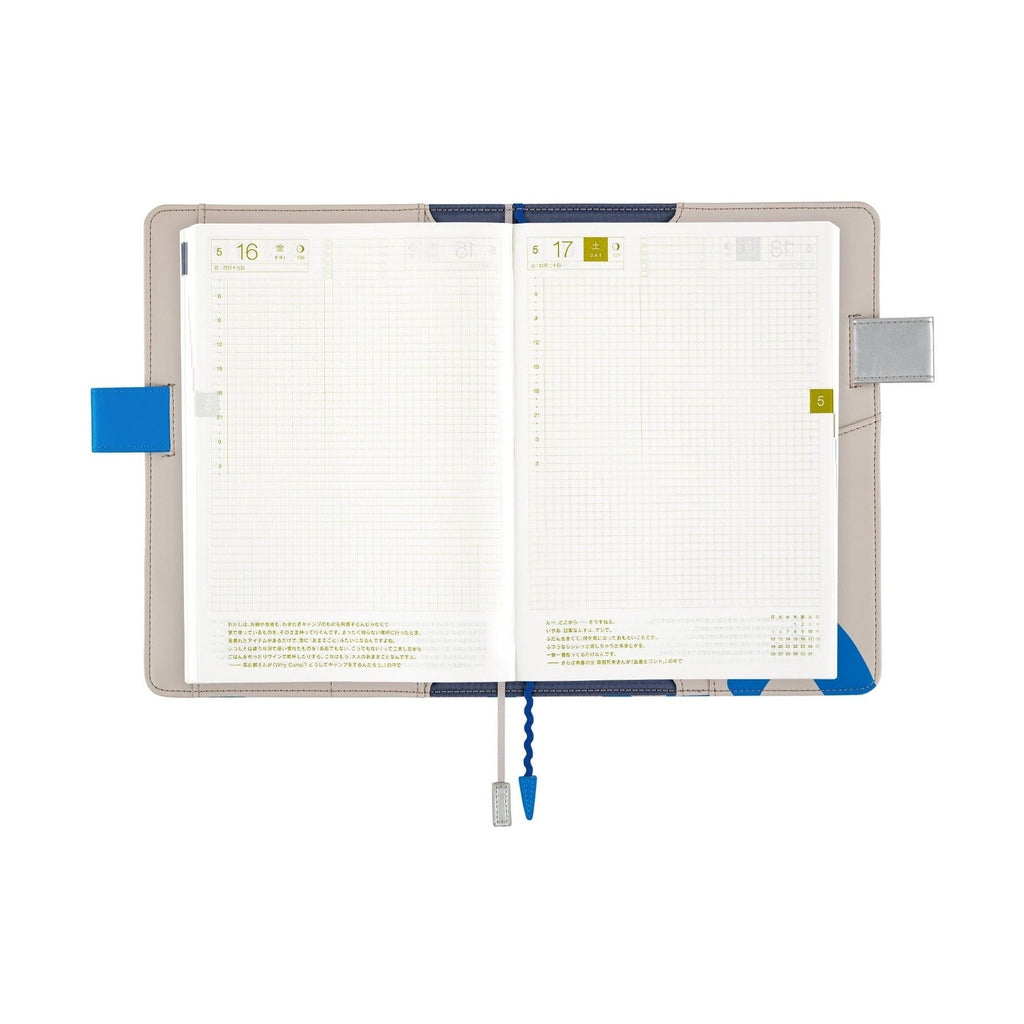 Open Hobonichi Techo A5 Cousins planner cover with blue sea wave pattern and butterfly pen holders