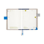 Open Hobonichi Techo A5 Cousins planner cover with blue sea wave pattern and butterfly pen holders