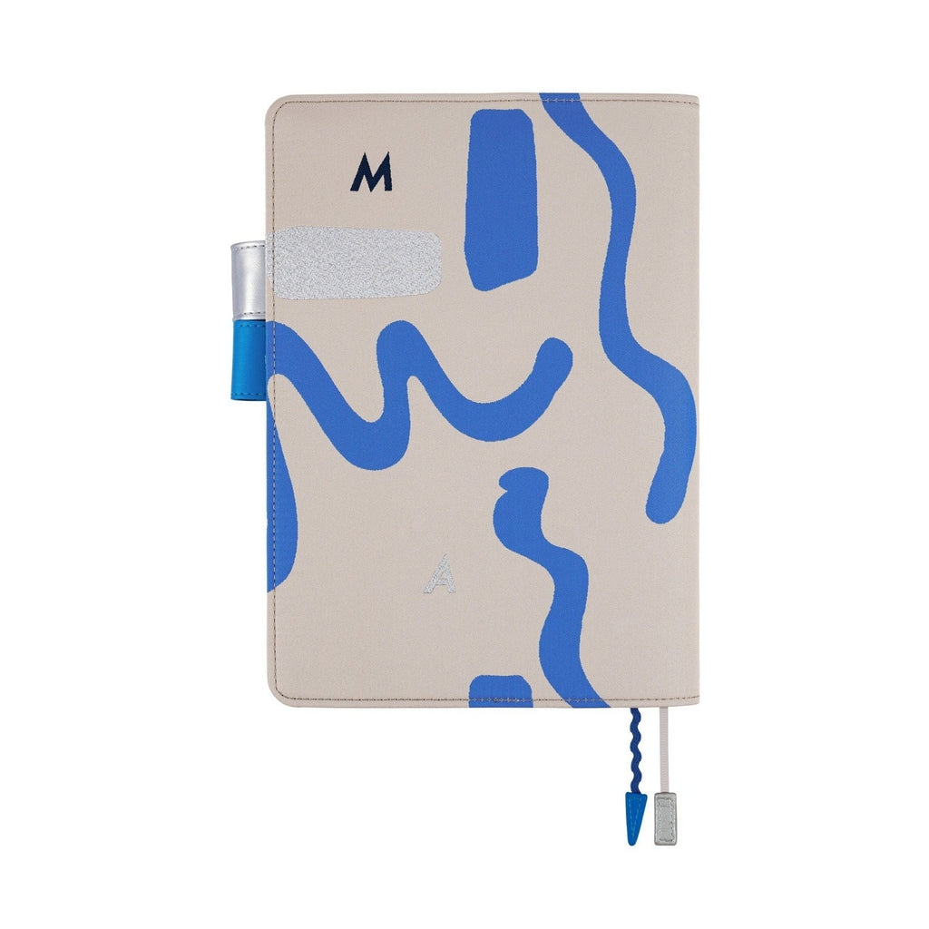 Beige Hobonichi Techo A5 planner cover with abstract blue shapes and silver lettering MA