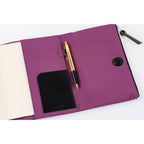 Hobonichi Techo A5 purple tri-fold planner cover open with pen hook and card pocket