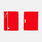 Front and back view of closed red Hobonichi Techo A5 Tragen cover with vertical zipper