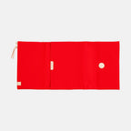 Open red Hobonichi Techo A5 cover showing interior layout with magnetic button closure