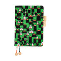 Hobonichi Techo A5 planner cover with green forest house pattern and beaded tassels