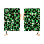 Pair of Hobonichi Techo A5 covers displaying symmetrical green house pattern design